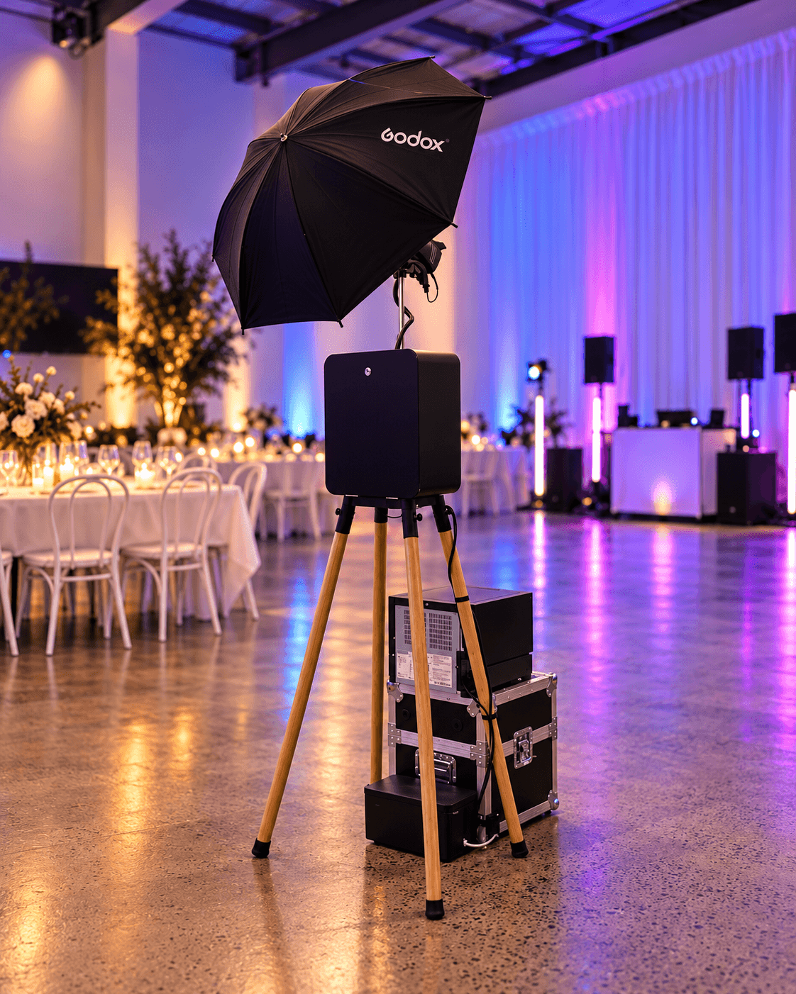 Rear view of the open photo booth on its wooden tripod